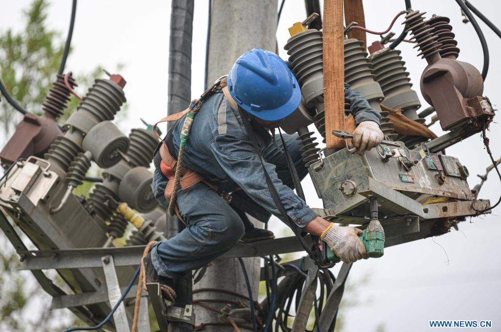 Chine : remise en état des installations électriques à Chengmai
